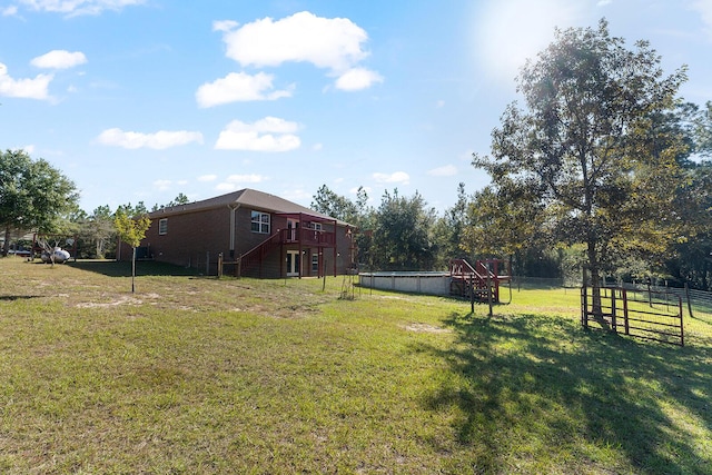 4555 Wolf Track Rdg Unit 6.44Ac, Crestview, FL 32539 - view of yard with a wooden deck and stairway