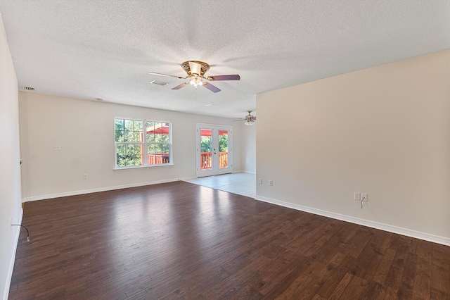4555 Wolf Track Rdg Unit 6.44Ac, Crestview, FL 32539 - unfurnished room featuring a ceiling fan, wood finished floors, a textured ceiling, french doors, and baseboards