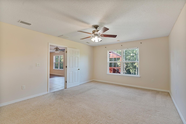 4555 Wolf Track Rdg Unit 6.44Ac, Crestview, FL 32539 - spare room with light colored carpet, plenty of natural light, a ceiling fan, and a textured ceiling