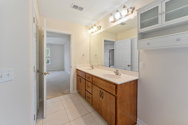 4555 Wolf Track Rdg Unit 6.44Ac, Crestview, FL 32539 - bathroom with double vanity, baseboards, and tile patterned flooring