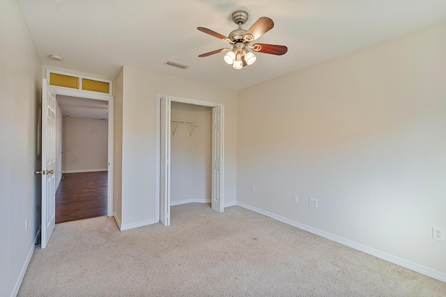 4555 Wolf Track Rdg Unit 6.44Ac, Crestview, FL 32539 - unfurnished bedroom with carpet floors, baseboards, a closet, and a ceiling fan