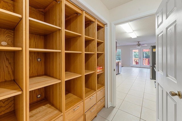 4555 Wolf Track Rdg Unit 6.44Ac, Crestview, FL 32539 - hall featuring light tile patterned floors and a textured ceiling