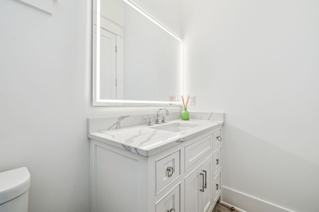 323 Pompano St, Inlet Beach, FL 32461 - half bathroom featuring vanity and toilet