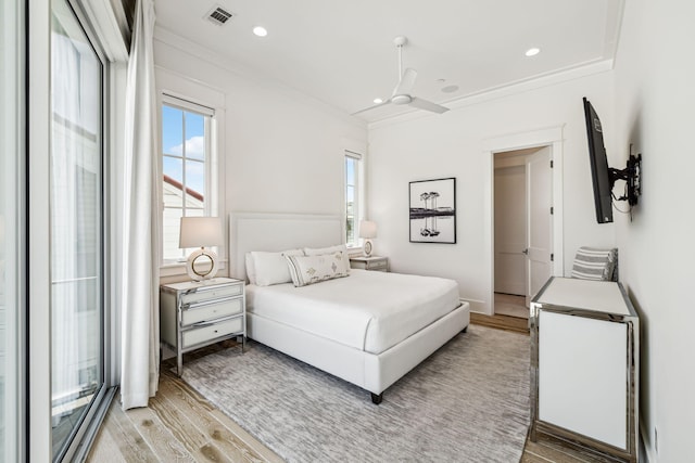 323 Pompano St, Inlet Beach, FL 32461 - bedroom featuring light wood-style floors, crown molding, multiple windows, and recessed lighting