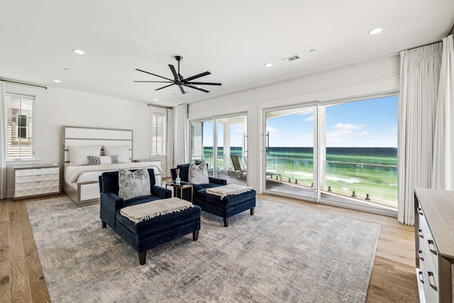 323 Pompano St, Inlet Beach, FL 32461 - bedroom with access to outside, a water view, wood finished floors, recessed lighting, and a ceiling fan
