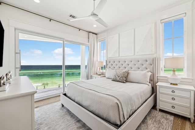 323 Pompano St, Inlet Beach, FL 32461 - bedroom featuring light wood-style floors, a water view, access to exterior, recessed lighting, and ceiling fan