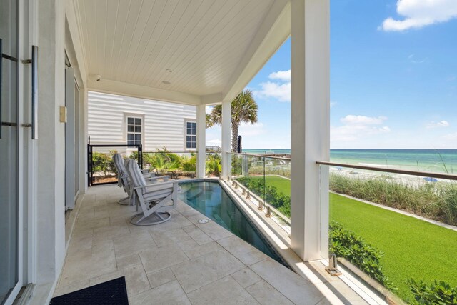 323 Pompano St, Inlet Beach, FL 32461 - sunroom featuring view of water and beach and wooden ceiling