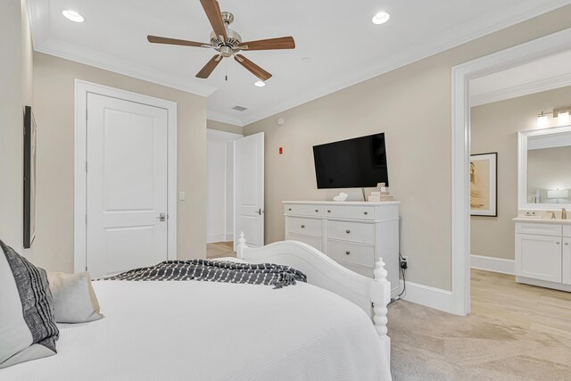 134 Norwood Dr Unit Ph1, Miramar Beach, FL 32550 - bedroom with ornamental molding, light carpet, recessed lighting, baseboards, and connected bathroom