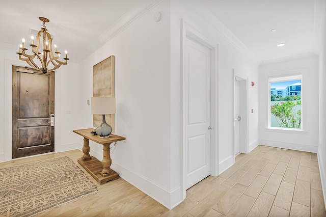 134 Norwood Dr Unit Ph1, Miramar Beach, FL 32550 - foyer entrance featuring a chandelier, ornamental molding, baseboards, light wood-style floors, and recessed lighting