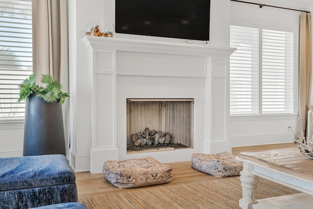 134 Norwood Dr Unit Ph1, Miramar Beach, FL 32550 - detailed view of a fireplace and wood finished floors