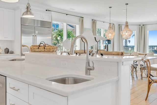 134 Norwood Dr Unit Ph1, Miramar Beach, FL 32550 - kitchen with stainless steel built in refrigerator, light countertops, a sink, and plenty of natural light