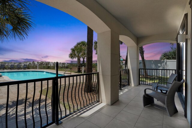 134 Norwood Dr Unit Ph1, Miramar Beach, FL 32550 - balcony at dusk with view of pool area