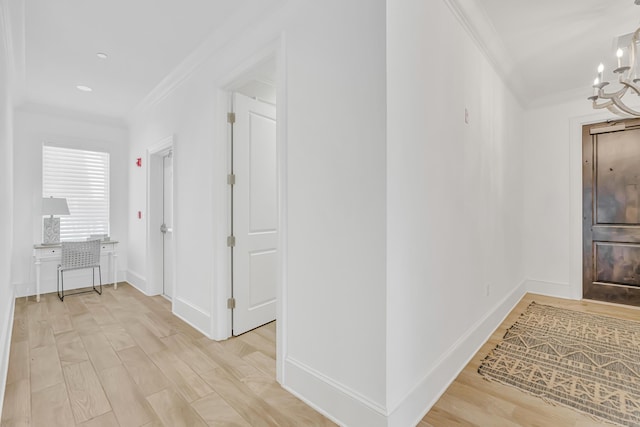 134 Norwood Dr Unit Ph1, Miramar Beach, FL 32550 - hall featuring ornamental molding, a chandelier, light wood-style flooring, and baseboards