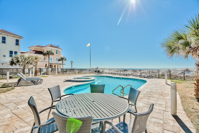 134 Norwood Dr Unit Ph1, Miramar Beach, FL 32550 - community pool with a hot tub and a patio area