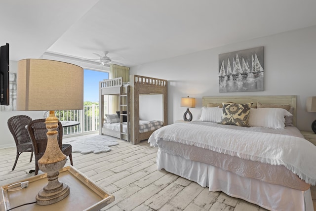 9800 Grand Sandestin Blvd Unit 5602/5604, Sandestin, FL 32550 - bedroom featuring a wall of windows, access to outside, wood finished floors, and ceiling fan