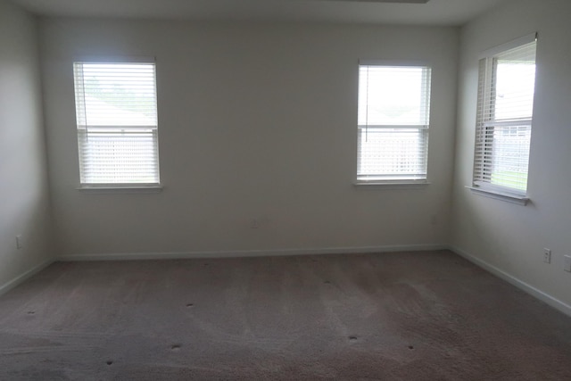 106 E Sky Way, Freeport, FL 32439 - spare room with light colored carpet, healthy amount of natural light, and baseboards