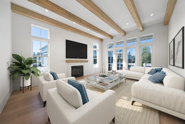 181 Climbing Rose Way, Santa Rosa Beach, FL 32459 - living room featuring beam ceiling, wood finished floors, recessed lighting, and a fireplace