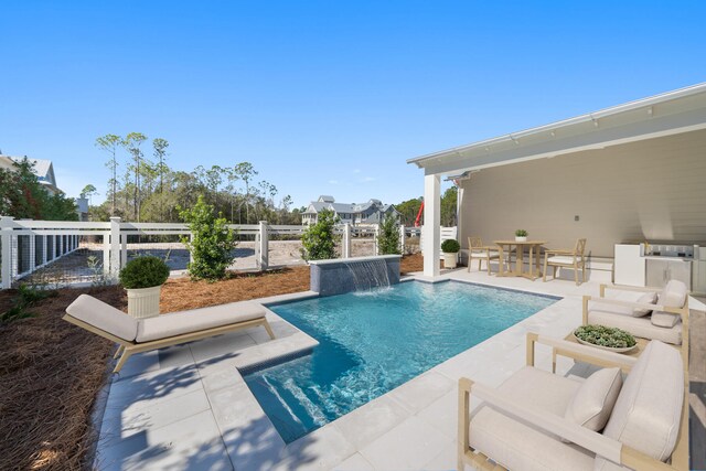 181 Climbing Rose Way, Santa Rosa Beach, FL 32459 - view of swimming pool featuring a patio and an outdoor kitchen