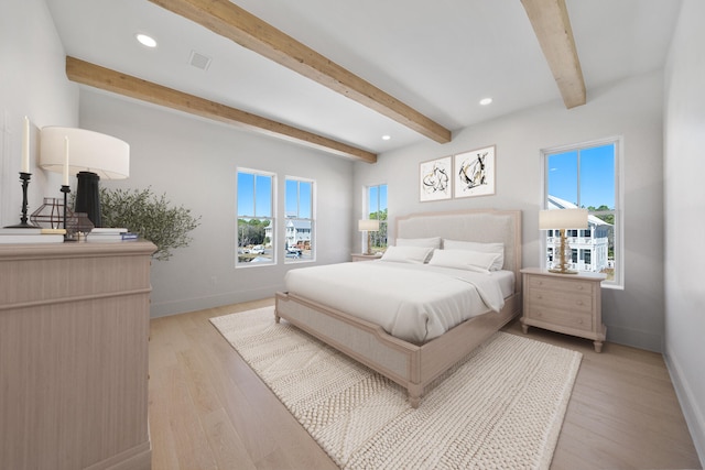 181 Climbing Rose Way, Santa Rosa Beach, FL 32459 - bedroom featuring beam ceiling, baseboards, light wood finished floors, and recessed lighting