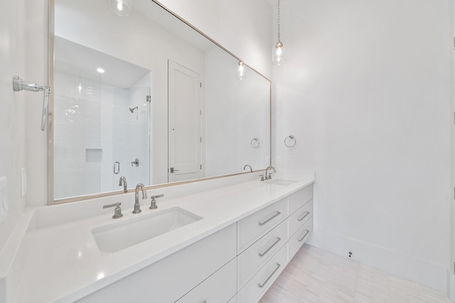181 Climbing Rose Way, Santa Rosa Beach, FL 32459 - full bathroom featuring double vanity, a shower stall, and baseboards