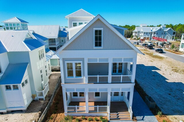 181 Climbing Rose Way, Santa Rosa Beach, FL 32459 - back of house with a balcony and covered porch