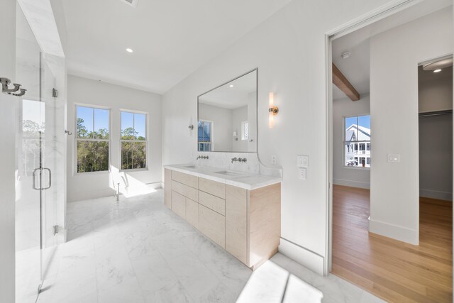 181 Climbing Rose Way, Santa Rosa Beach, FL 32459 - full bath with plenty of natural light, a marble finish shower, double vanity, recessed lighting, and baseboards