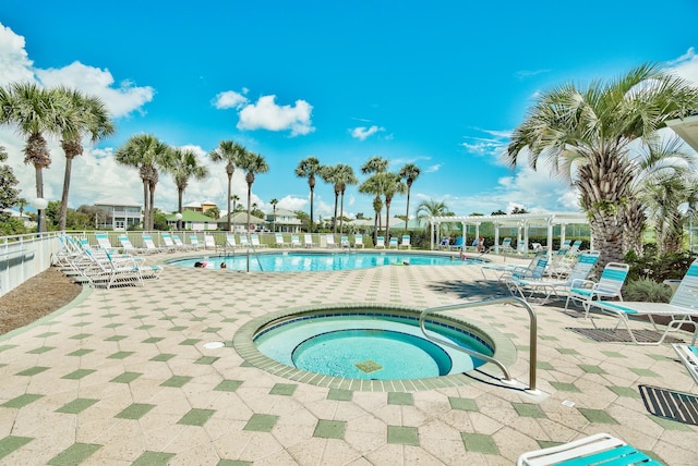 2606 Scenic Gulf Dr Unit 3208, Miramar Beach, FL 32550 - community pool featuring a pergola, a hot tub, and a patio