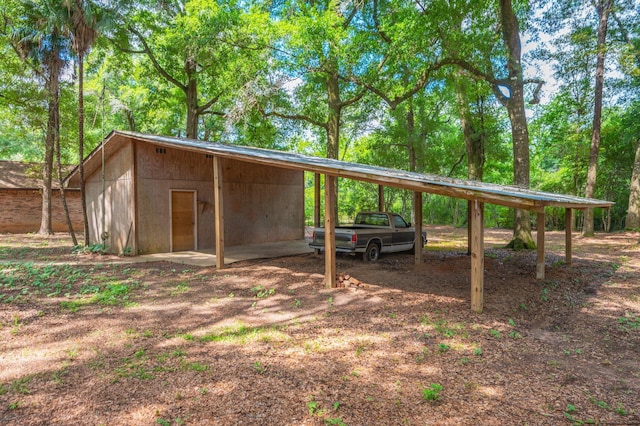 1131 Stanley Ln, Baker, FL 32531 - view of outbuilding with a carport