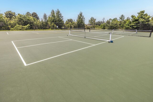 235 Coastal Breeze Dr, Freeport, FL 32439 - view of tennis court with community basketball court