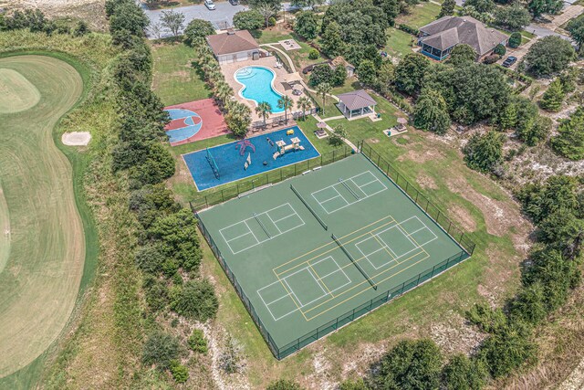 235 Coastal Breeze Dr, Freeport, FL 32439 - bird's eye view of a pool and a golf club