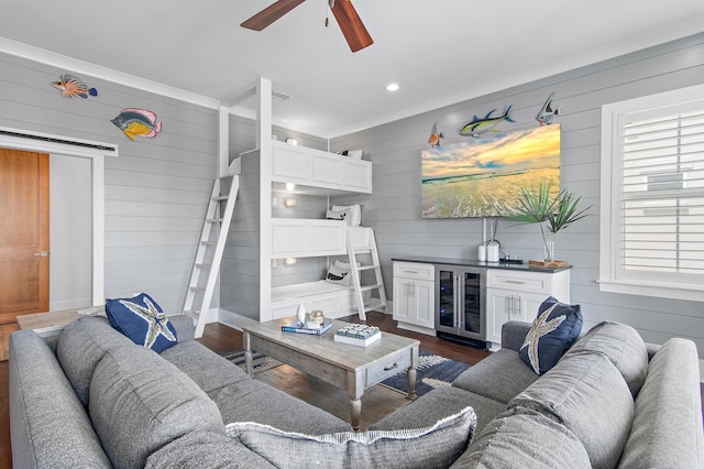11 Wadleigh Way, Miramar Beach, FL 32550 - living room with beverage cooler, wood walls, a ceiling fan, dark wood-style flooring, and a bar