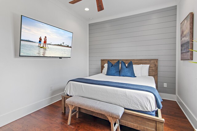 11 Wadleigh Way, Miramar Beach, FL 32550 - bedroom with wood finished floors, recessed lighting, baseboards, a ceiling fan, and wood walls