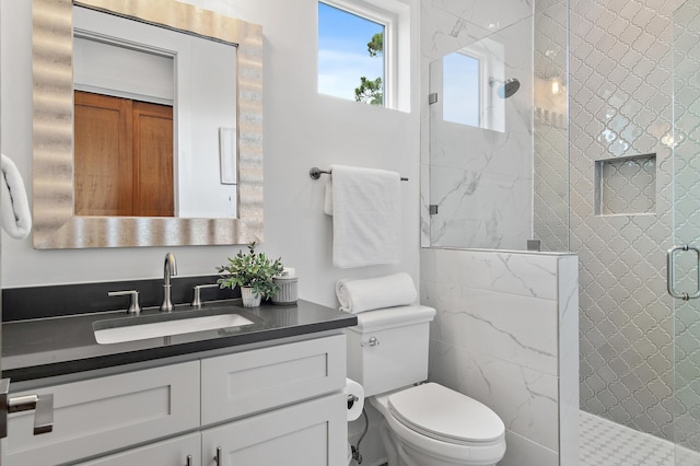 11 Wadleigh Way, Miramar Beach, FL 32550 - full bathroom featuring a stall shower, vanity, and toilet