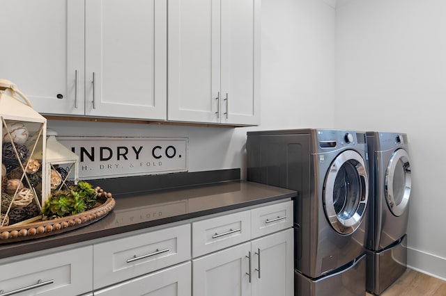 11 Wadleigh Way, Miramar Beach, FL 32550 - washroom featuring separate washer and dryer, cabinet space, wood finished floors, and baseboards