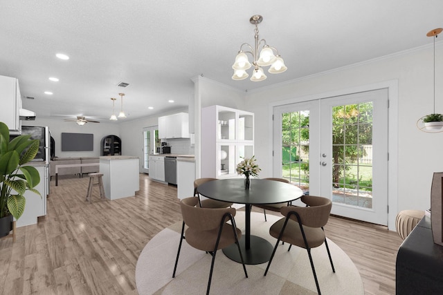 709 Russell Blvd, Fort Walton Beach, FL 32547 - dining space with a chandelier, light wood-style flooring, ornamental molding, ceiling fan, and recessed lighting