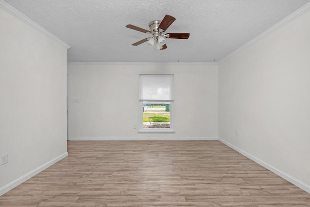 709 Russell Blvd, Fort Walton Beach, FL 32547 - empty room featuring ceiling fan, light wood-style flooring, crown molding, a textured ceiling, and baseboards