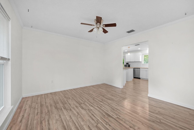709 Russell Blvd, Fort Walton Beach, FL 32547 - unfurnished living room with light wood finished floors, ceiling fan, baseboards, and ornamental molding