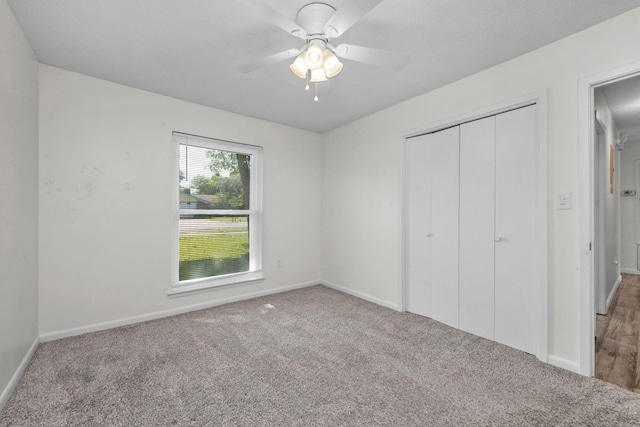 709 Russell Blvd, Fort Walton Beach, FL 32547 - unfurnished bedroom featuring carpet floors, baseboards, a closet, and ceiling fan