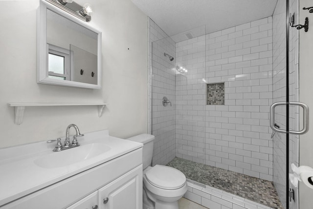 709 Russell Blvd, Fort Walton Beach, FL 32547 - bathroom with toilet, a stall shower, vanity, and a textured ceiling