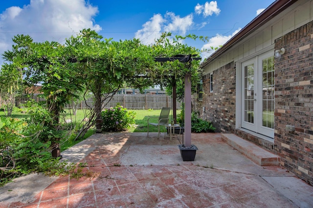 709 Russell Blvd, Fort Walton Beach, FL 32547 - fenced backyard with french doors and a patio