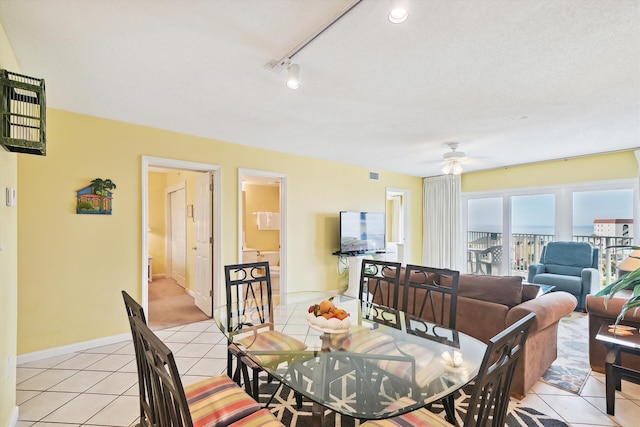 895 Santa Rosa Blvd Unit 707, Fort Walton Beach, FL 32548 - dining room with light tile patterned flooring, a ceiling fan, and baseboards