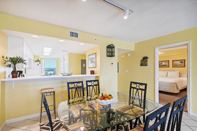 895 Santa Rosa Blvd Unit 707, Fort Walton Beach, FL 32548 - dining room with tile patterned flooring and baseboards