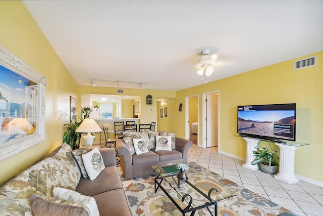 895 Santa Rosa Blvd Unit 707, Fort Walton Beach, FL 32548 - living room featuring tile patterned floors, a ceiling fan, baseboards, and track lighting