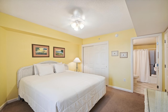 895 Santa Rosa Blvd Unit 707, Fort Walton Beach, FL 32548 - bedroom featuring a closet, baseboards, and carpet flooring