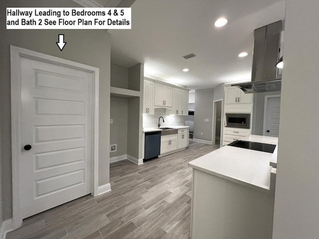 2675 Brodie Ln, Crestview, FL 32536 - kitchen featuring a sink, dishwasher, stainless steel microwave, baseboards, and recessed lighting
