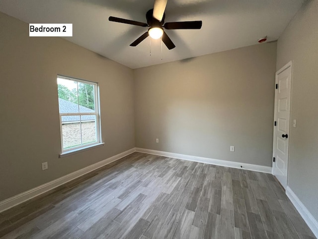 2675 Brodie Ln, Crestview, FL 32536 - spare room with ceiling fan, wood finished floors, and baseboards