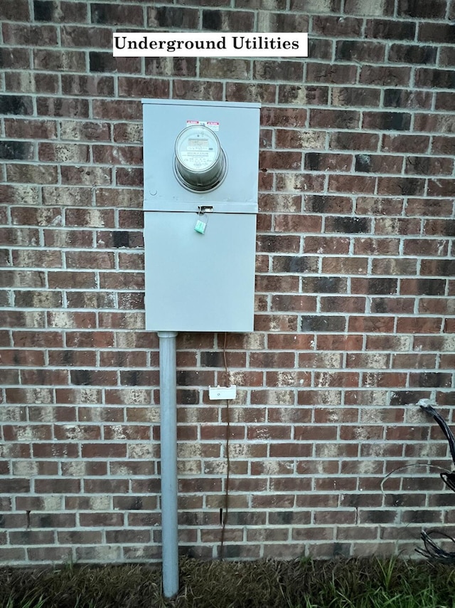 2675 Brodie Ln, Crestview, FL 32536 - exterior view of brick siding and electric meter
