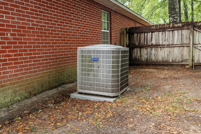 209 Warrior St, Crestview, FL 32536 - exterior view of brick siding and central AC unit