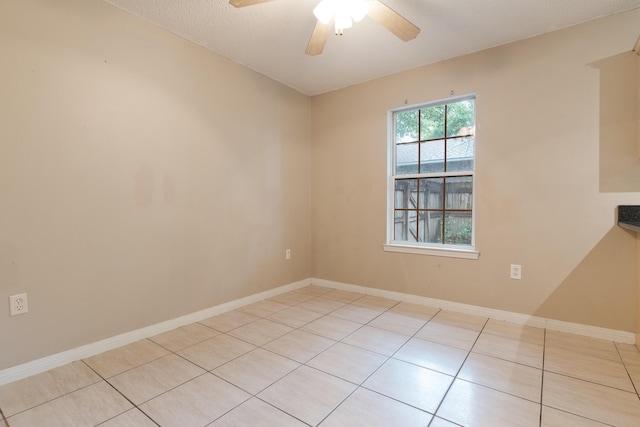 209 Warrior St, Crestview, FL 32536 - tiled spare room featuring a ceiling fan and baseboards