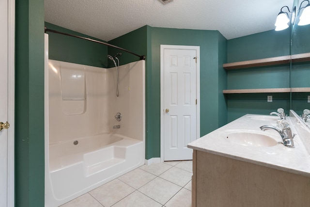 209 Warrior St, Crestview, FL 32536 - bathroom featuring tile patterned flooring, shower / tub combination, double vanity, and a textured ceiling